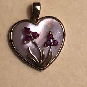 Vintage 10k shell, ruby, and diamond pendant